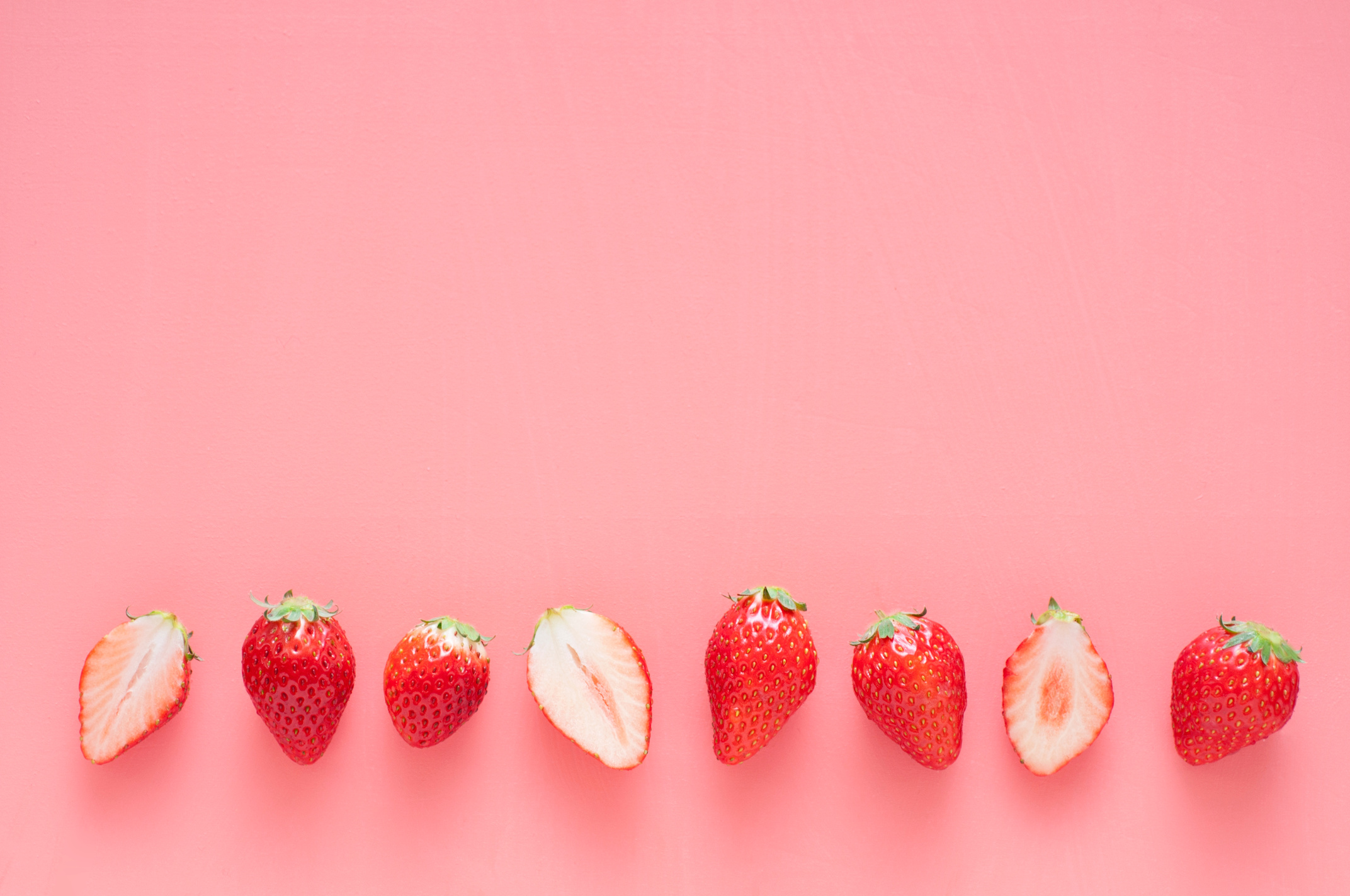 Strawberry on pink background